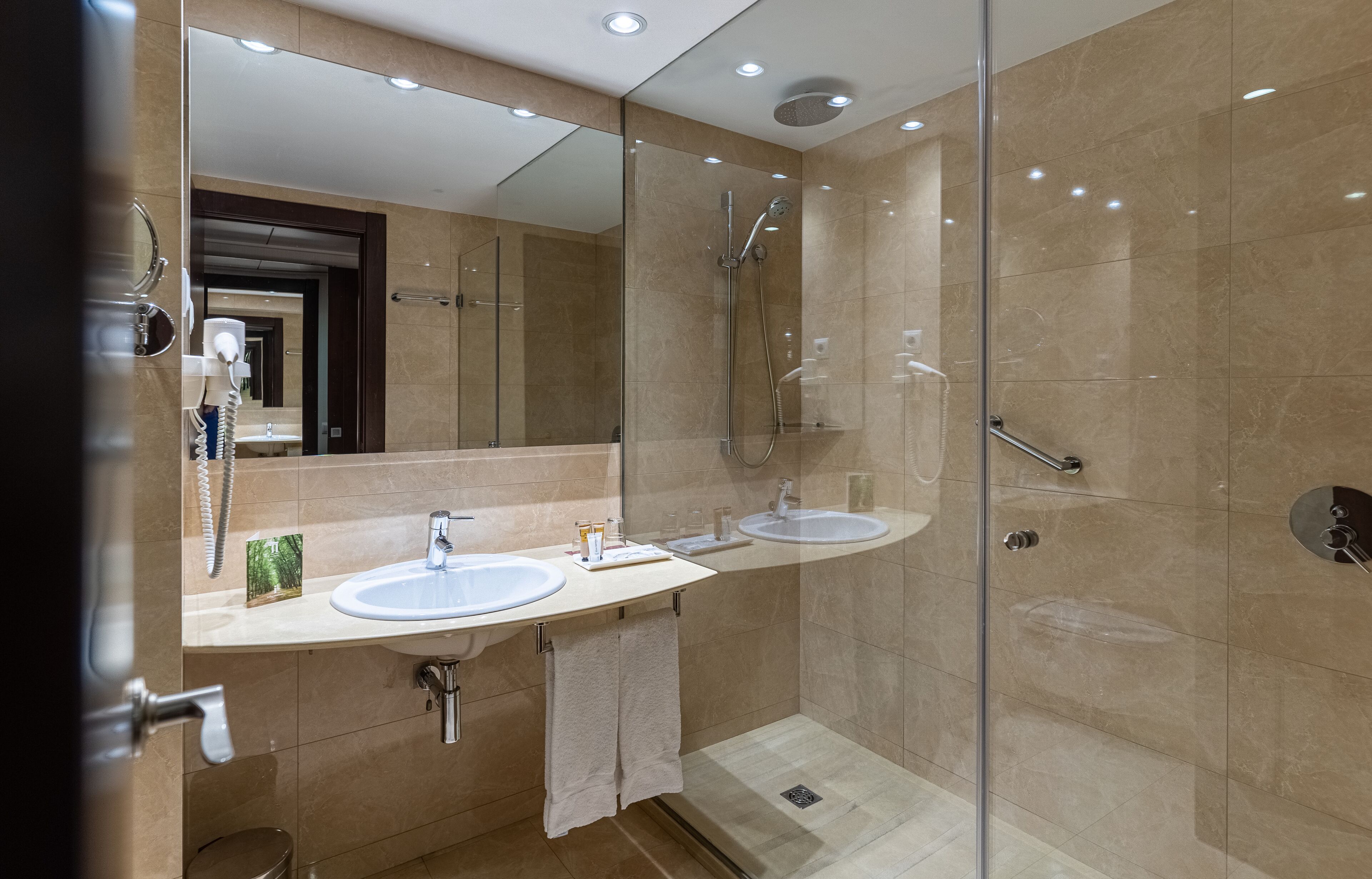 shower, rainfall showerhead, designer toiletries, hair dryer