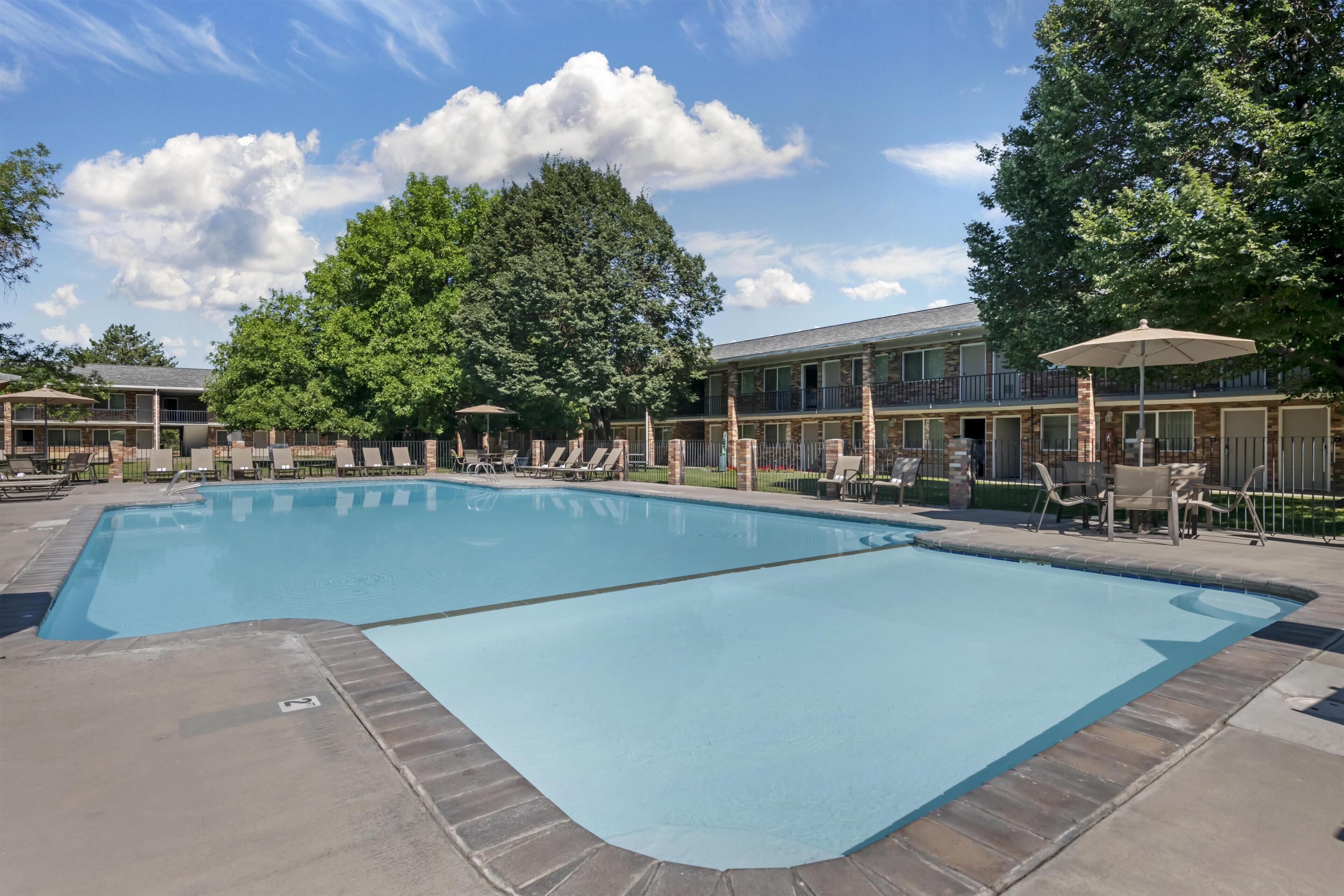 Seasonal outdoor pool, pool umbrellas, sun loungers