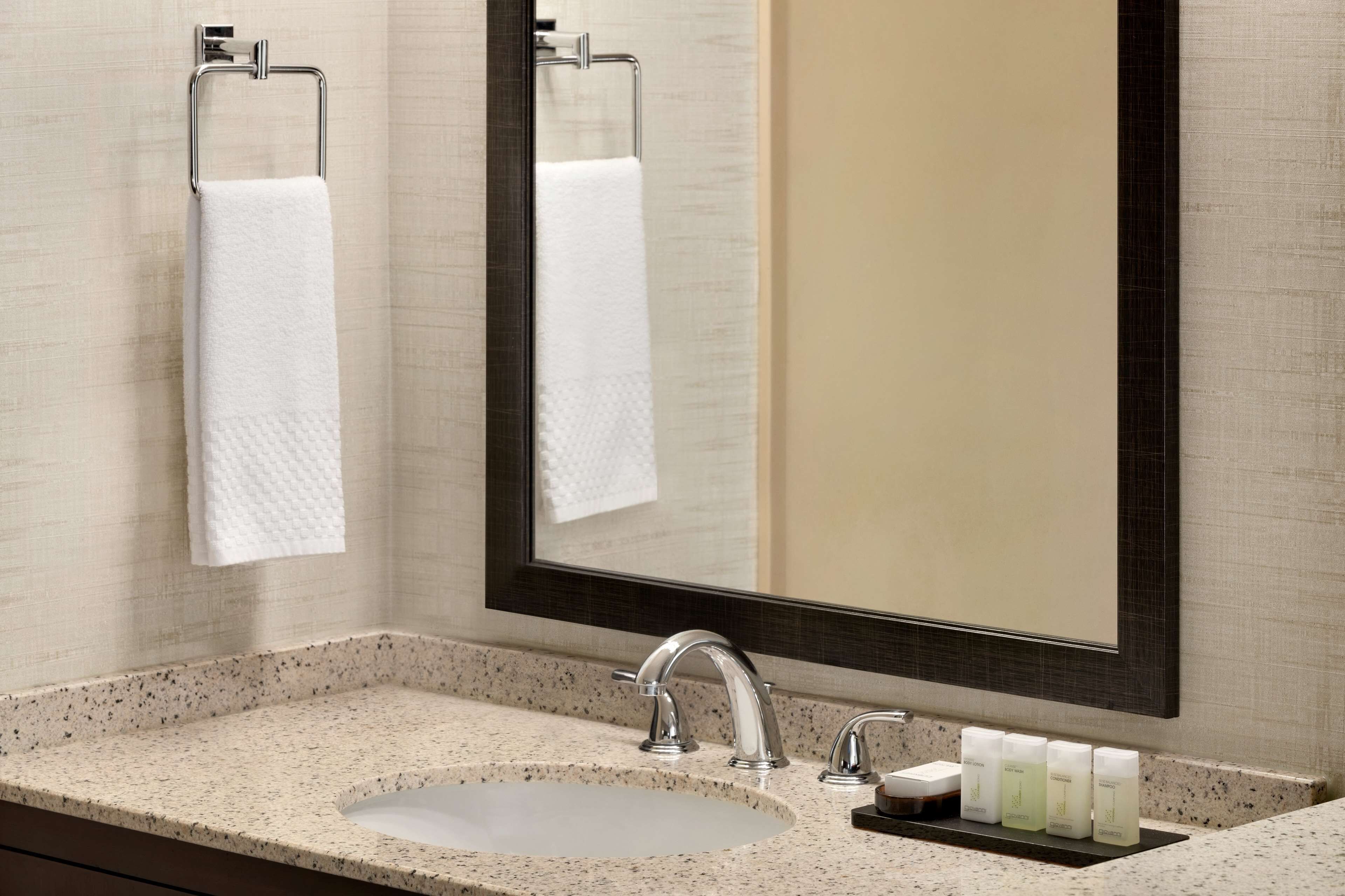 eco-friendly toiletries, hair dryer, towels, soap