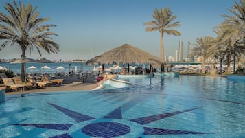 3 outdoor pools, open 8:00 AM to 7:00 PM, pool umbrellas, pool loungers