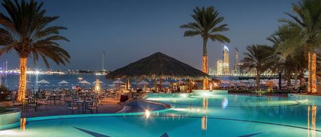 3 outdoor pools, open 8:00 AM to 7:00 PM, pool umbrellas, pool loungers