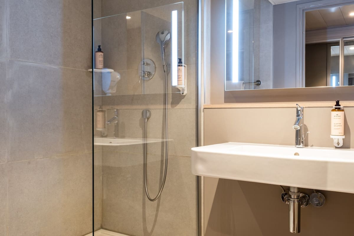 eco-friendly toiletries, hair dryer, towels