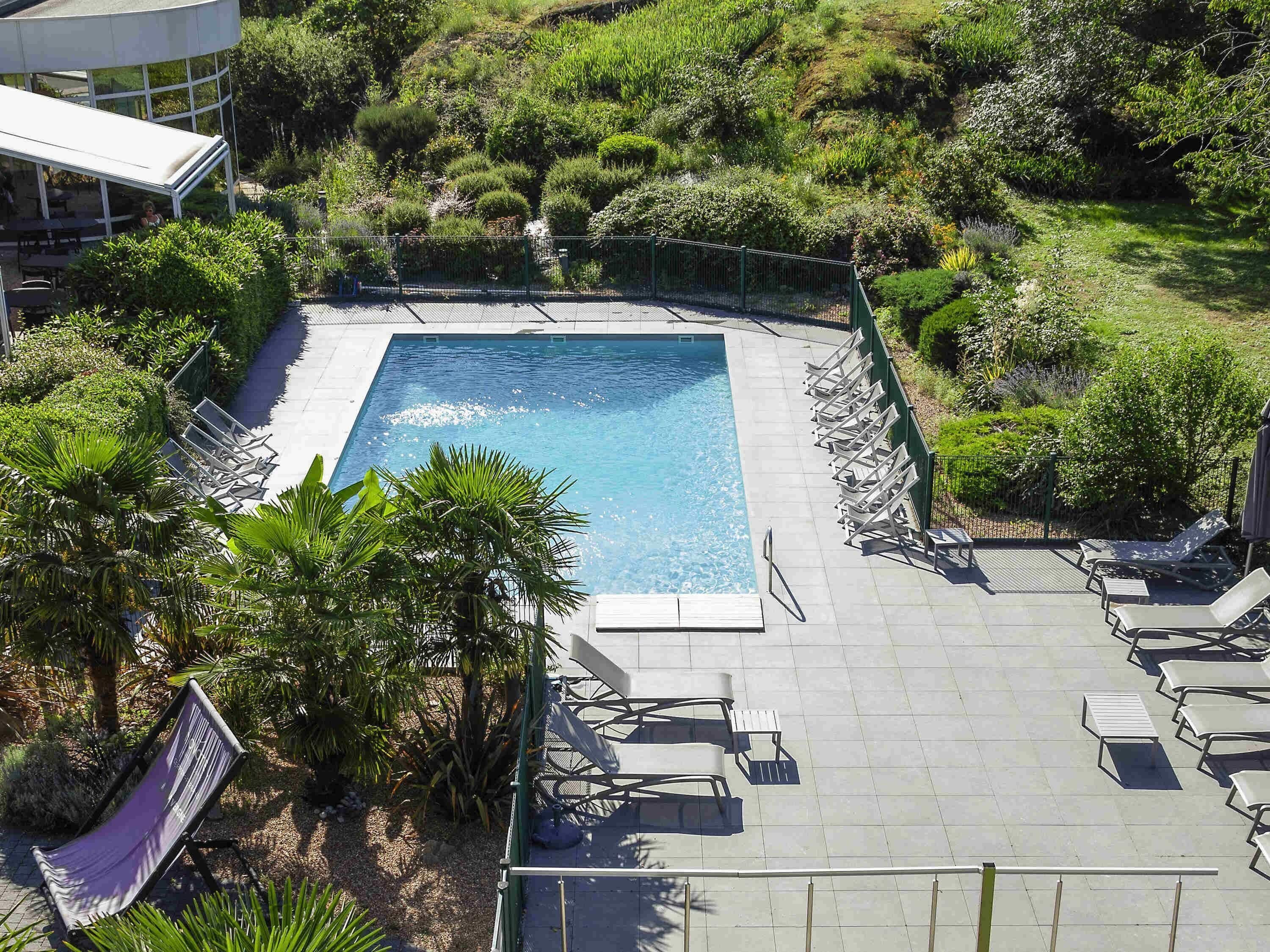 Seasonal outdoor pool, pool umbrellas, pool loungers
