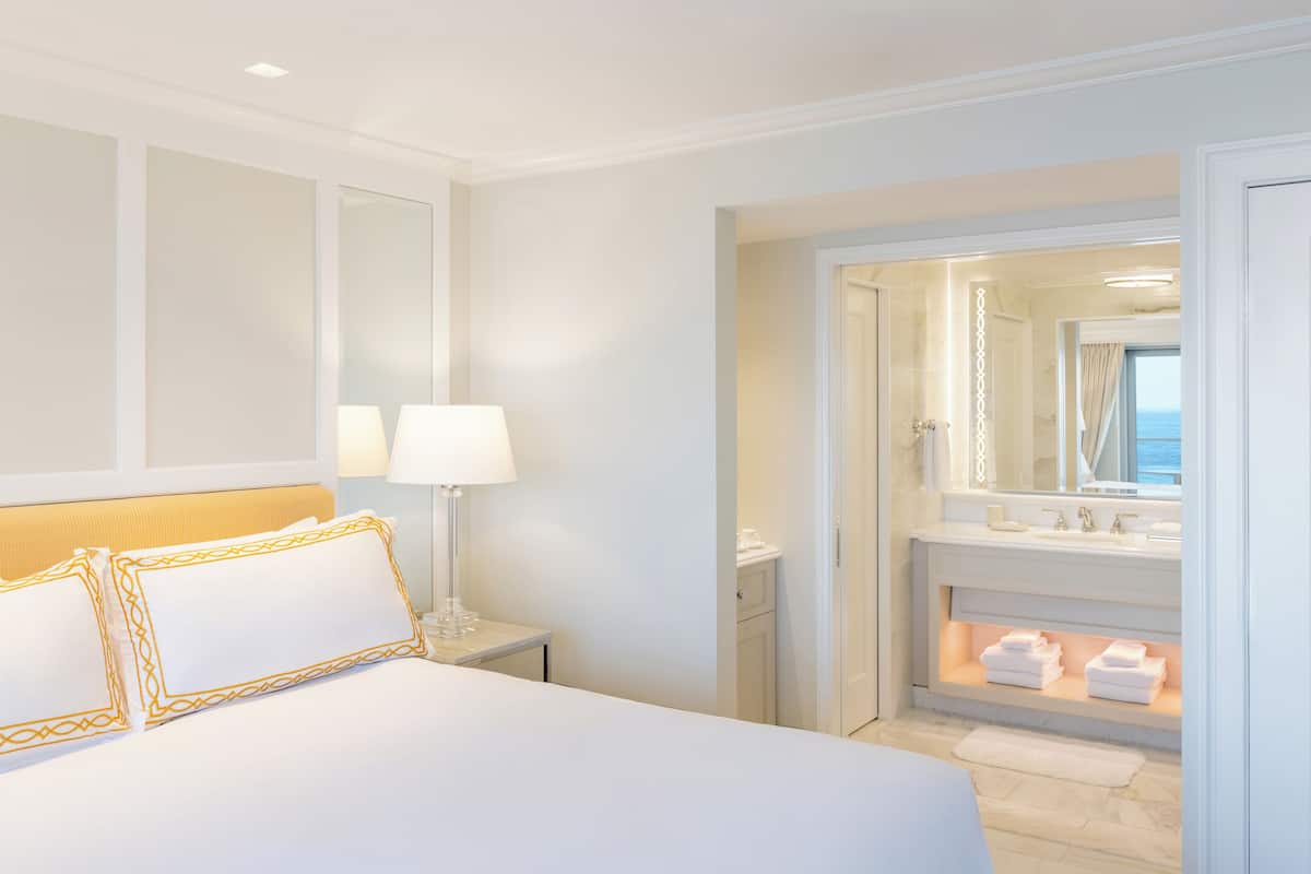 Premium bedding, down comforters, minibar, in-room safe