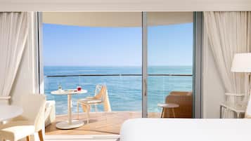 Premium bedding, down comforters, minibar, in-room safe