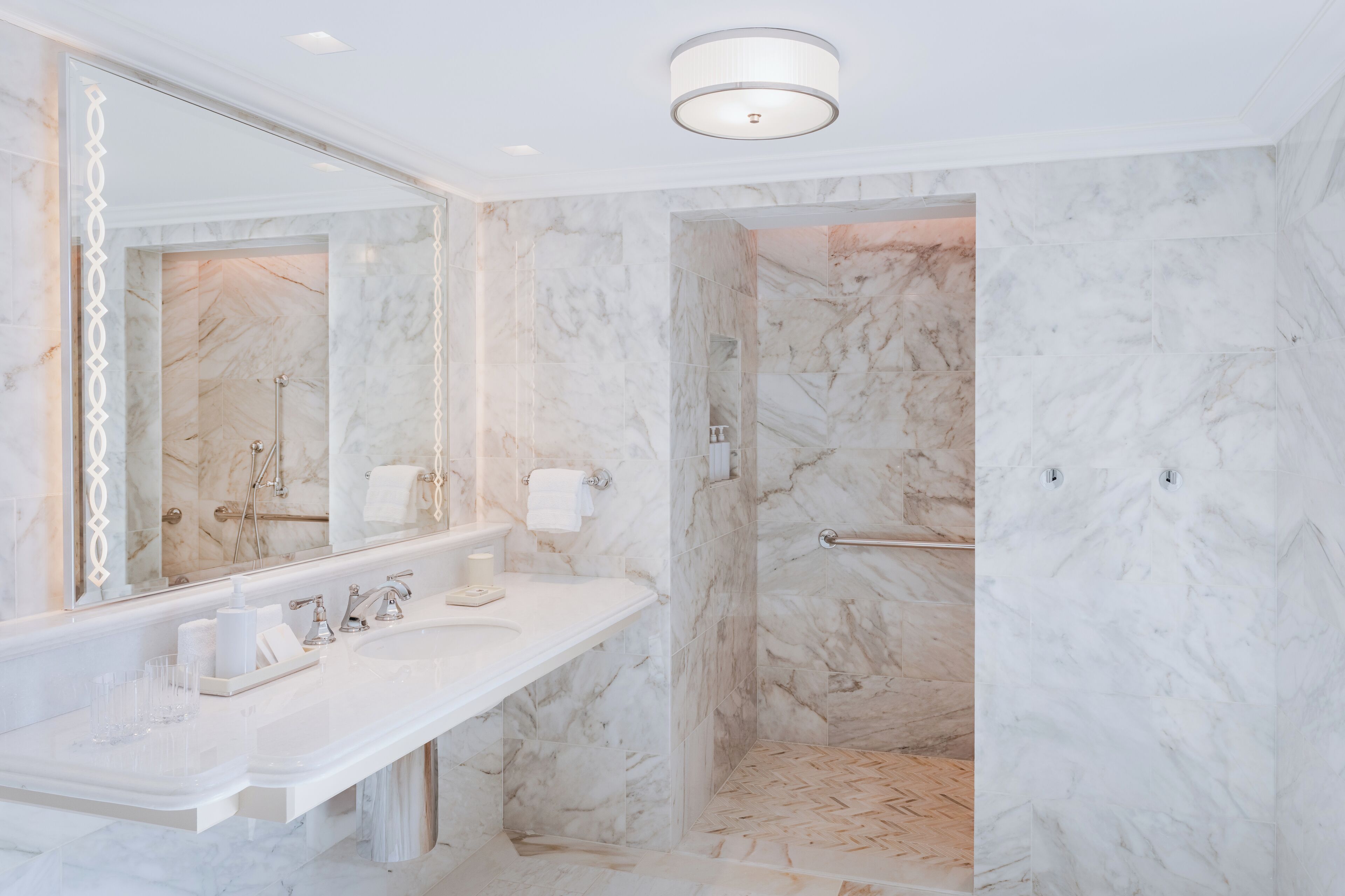 Combined shower/bathtub, designer toiletries, hair dryer, bathrobes