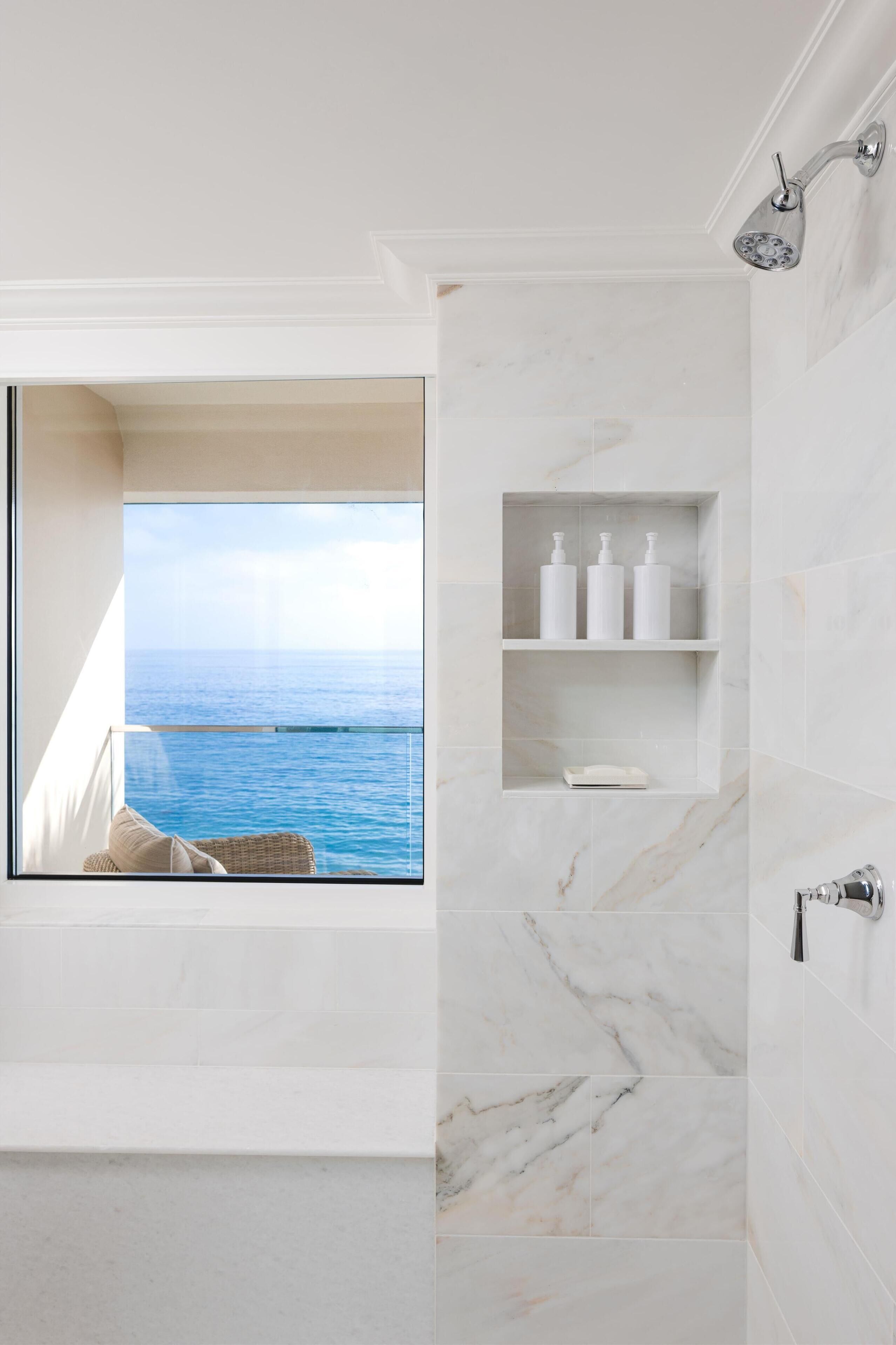 suite, 1 king bed, ocean view | bathroom | combined shower/bathtub, designer toiletries, hair dryer, bathrobes