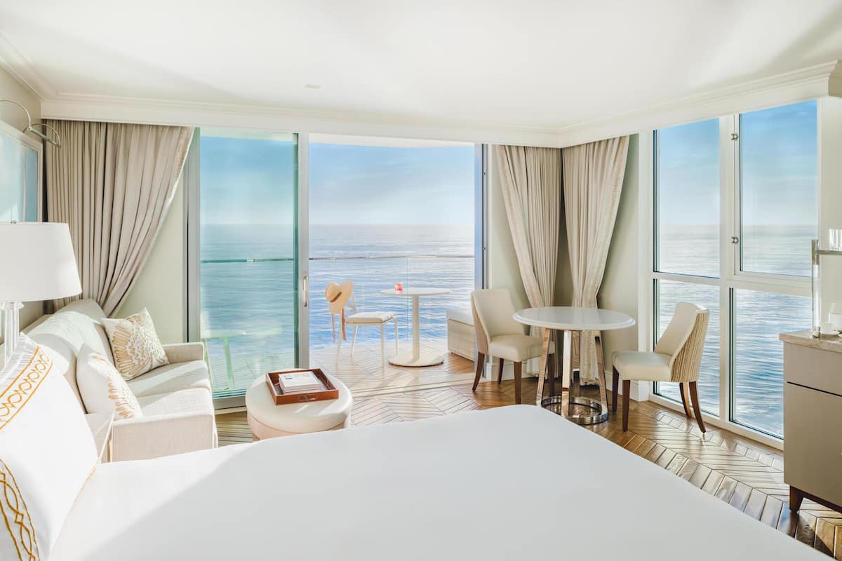 Premium bedding, down comforters, minibar, in-room safe