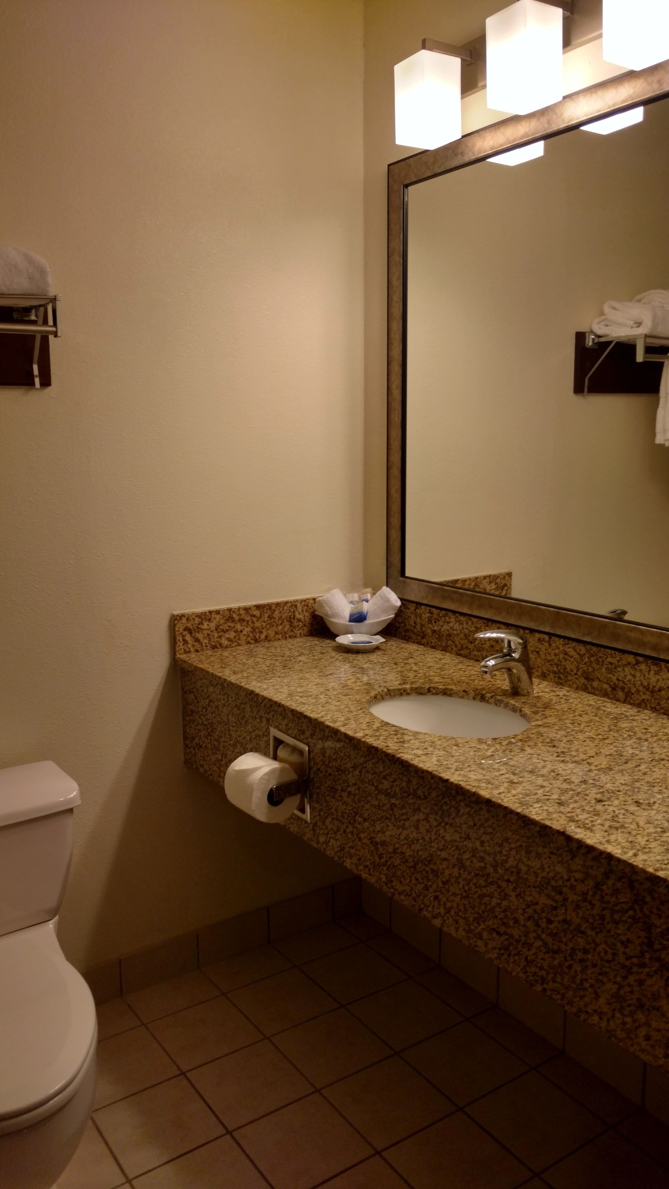 standard room, 1 king bed, non smoking, refrigerator & microwave | bathroom | free toiletries, hair dryer, towels, soap