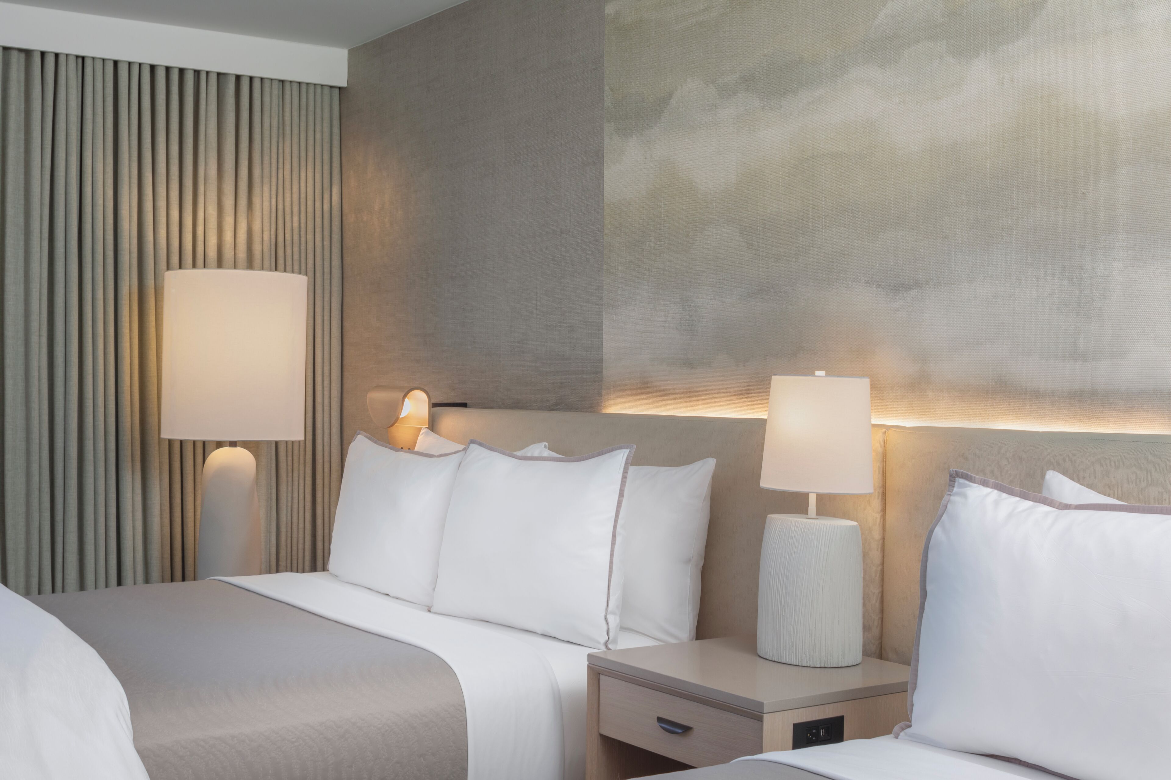Down comforters, pillowtop beds, in-room safe, desk