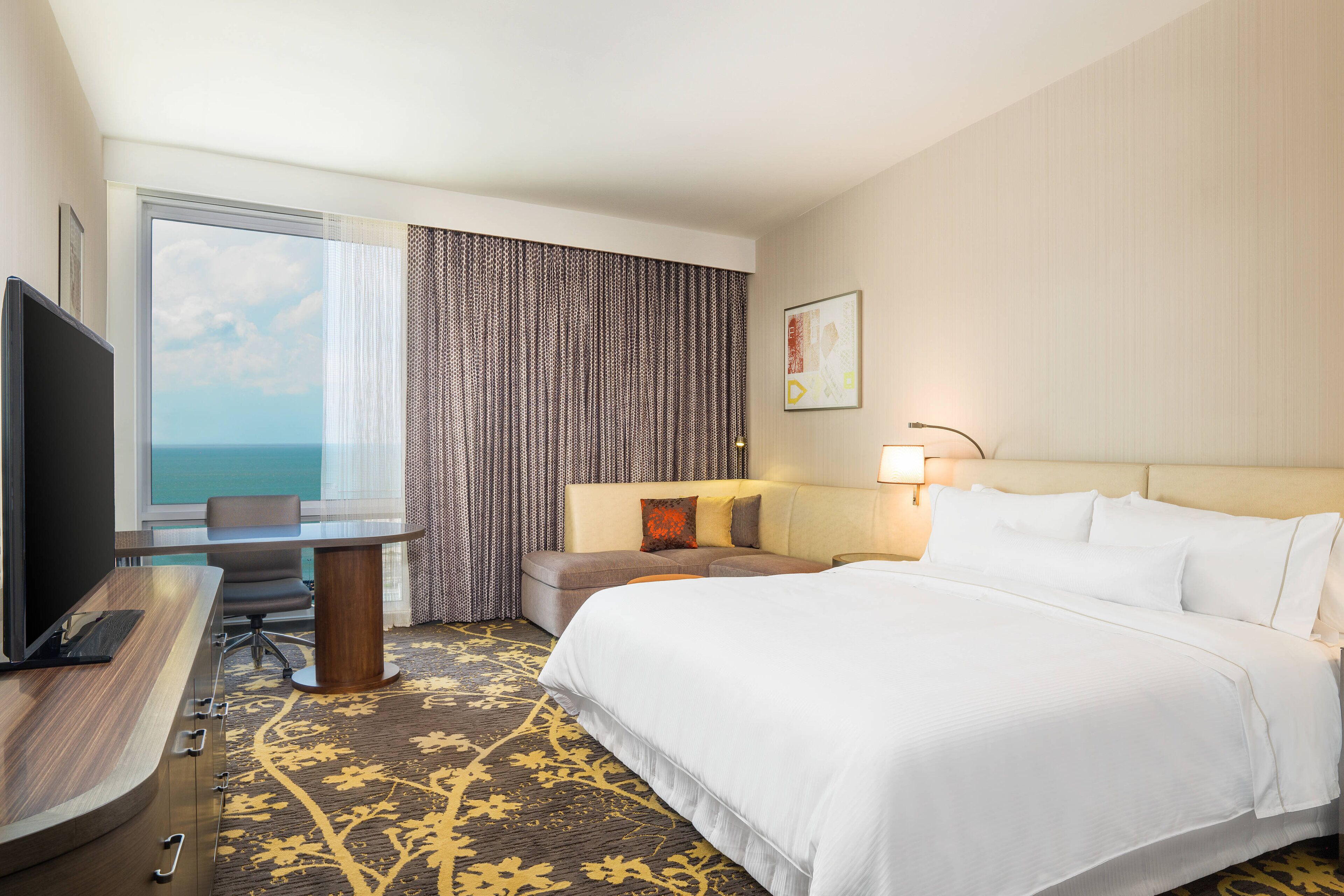 Down duvets, pillow-top beds, in-room safe, desk