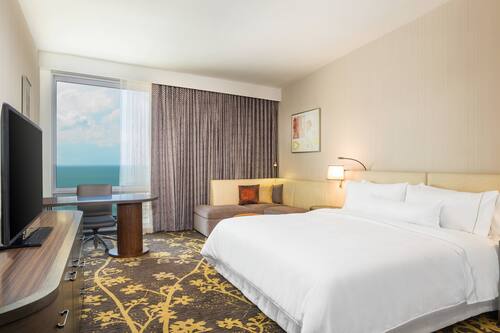 Down comforters, pillowtop beds, in-room safe, desk