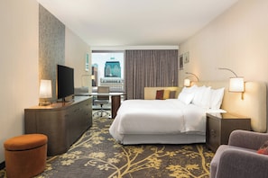 Relax in this stylish room with a large bed, flat-screen TV, and city views.