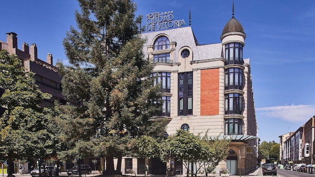 A historic building with a prominent tower and arched windows, labeled "Hotel Ciudad Devitoria." - Hotel Silken Ciudad de Vitoria (Vitoria-Gasteiz)