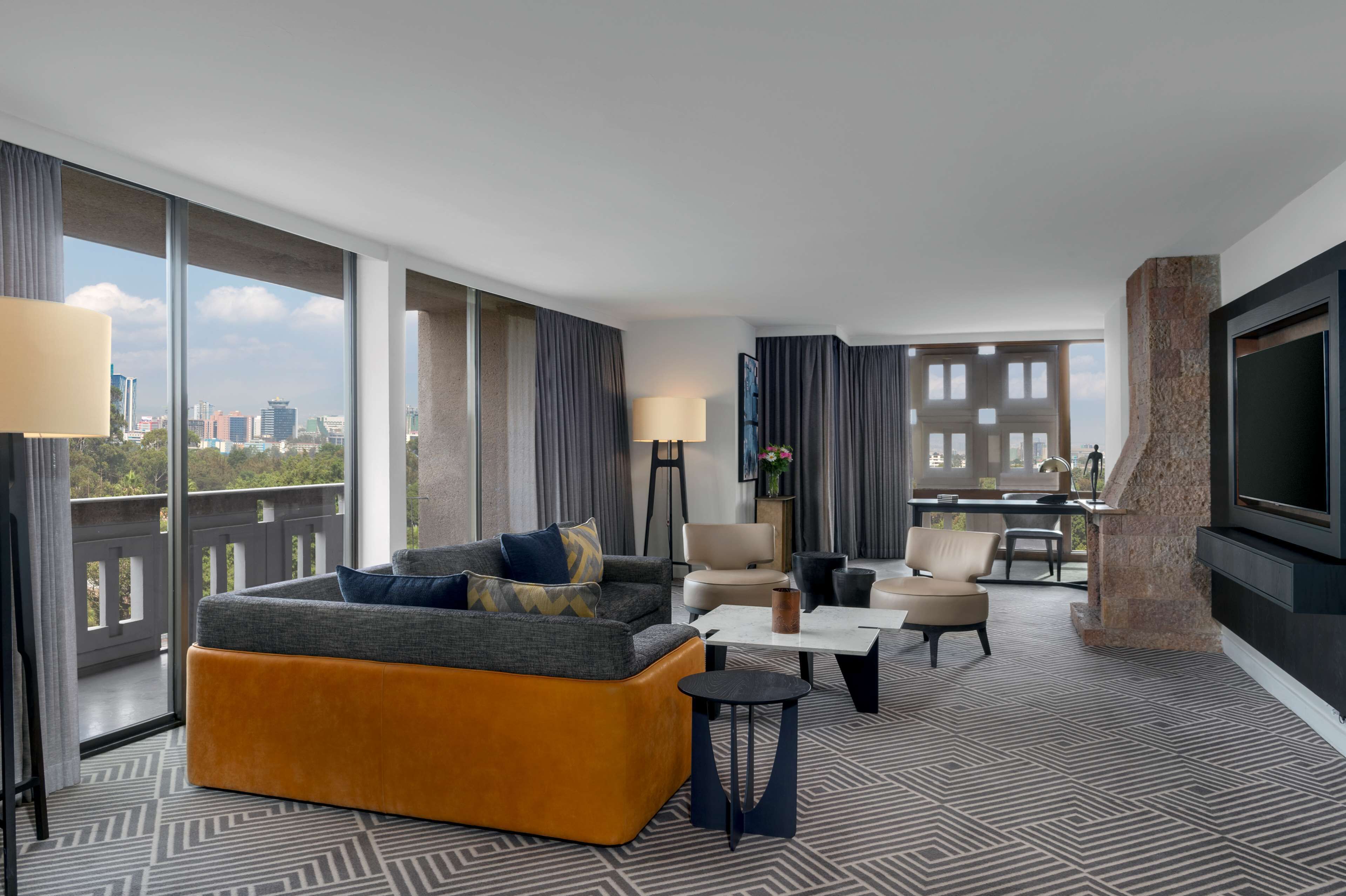 Suite, 1 King Bed (Ambassador) | Living area | 42-inch LCD TV with satellite channels, TV