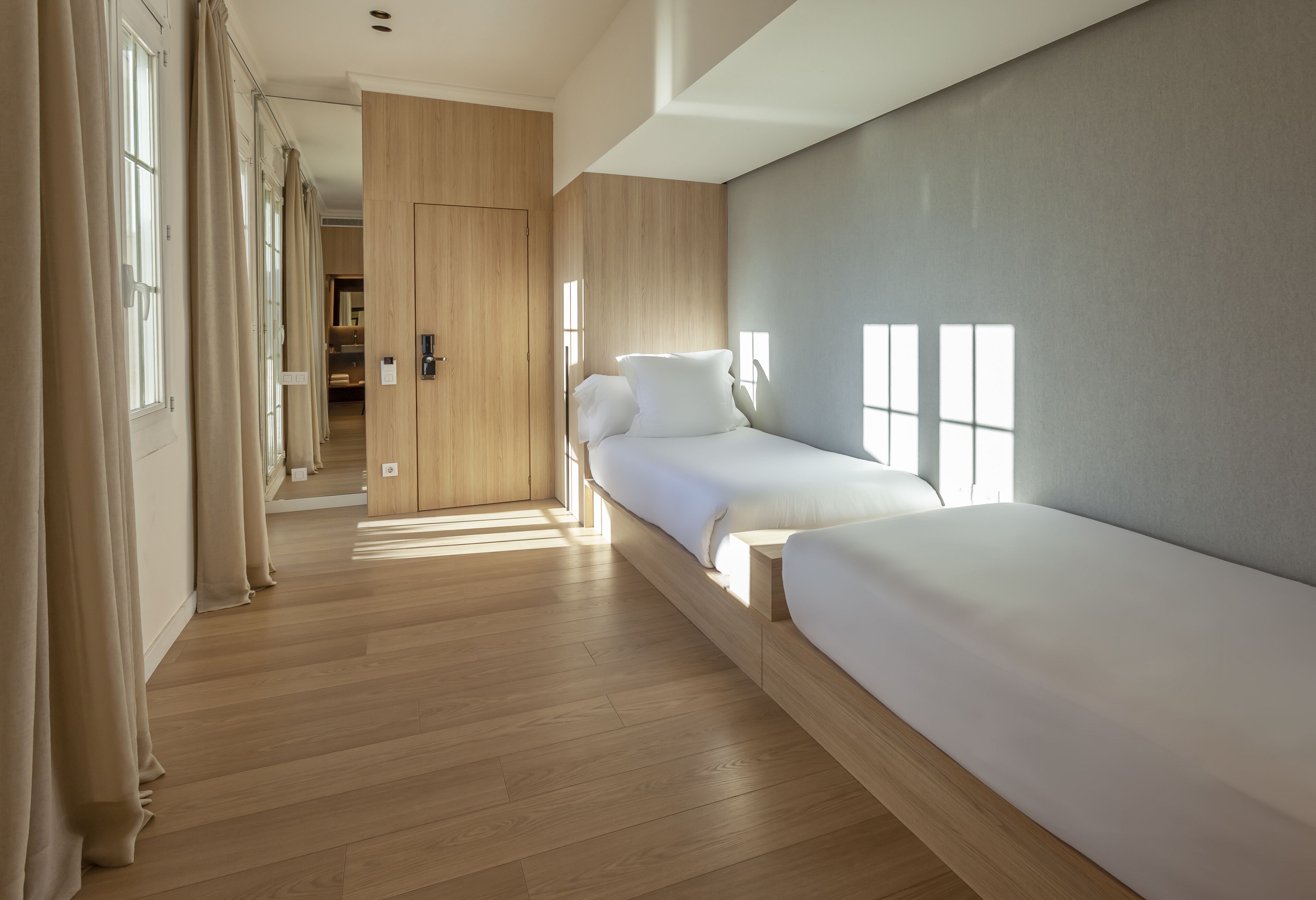 family room | premium bedding, minibar, in-room safe, desk