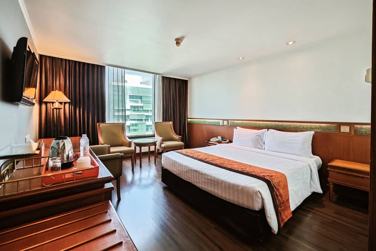 Business Deluxe Double | Minibar, brankas, meja kerja, dan tirai kedap cahaya