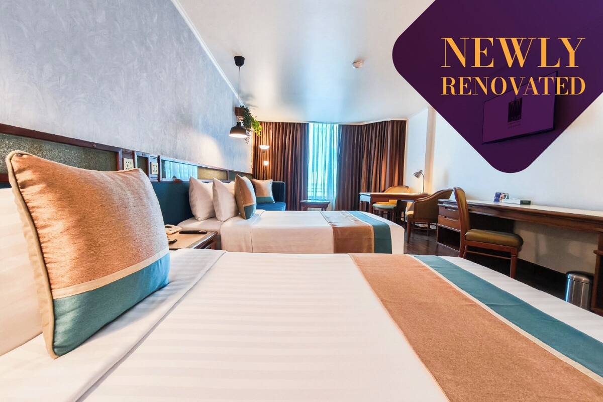 Kamar Twin Deluks | Minibar, brankas, meja kerja, dan tirai kedap cahaya
