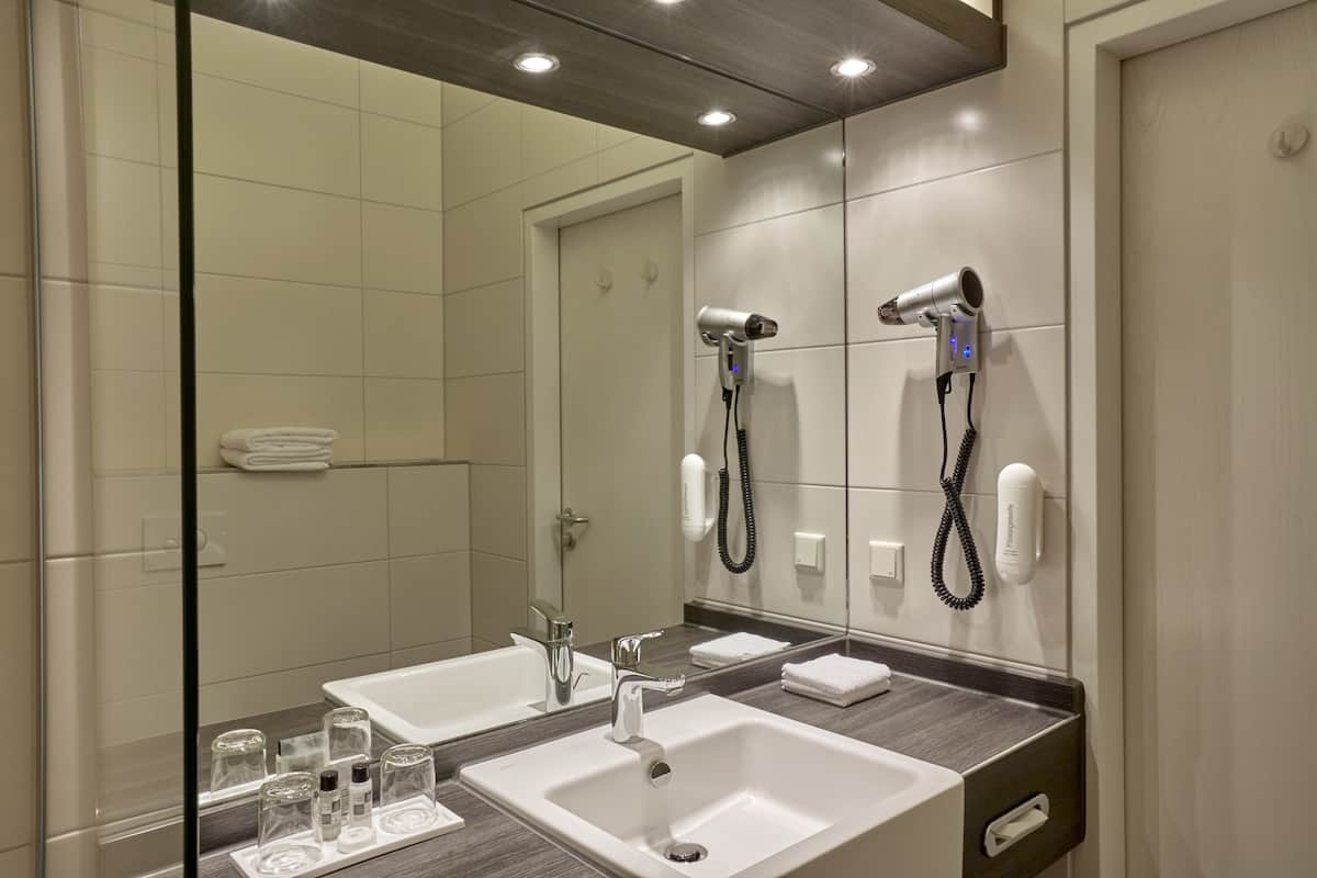 eco-friendly toiletries, hair dryer, bathrobes, towels