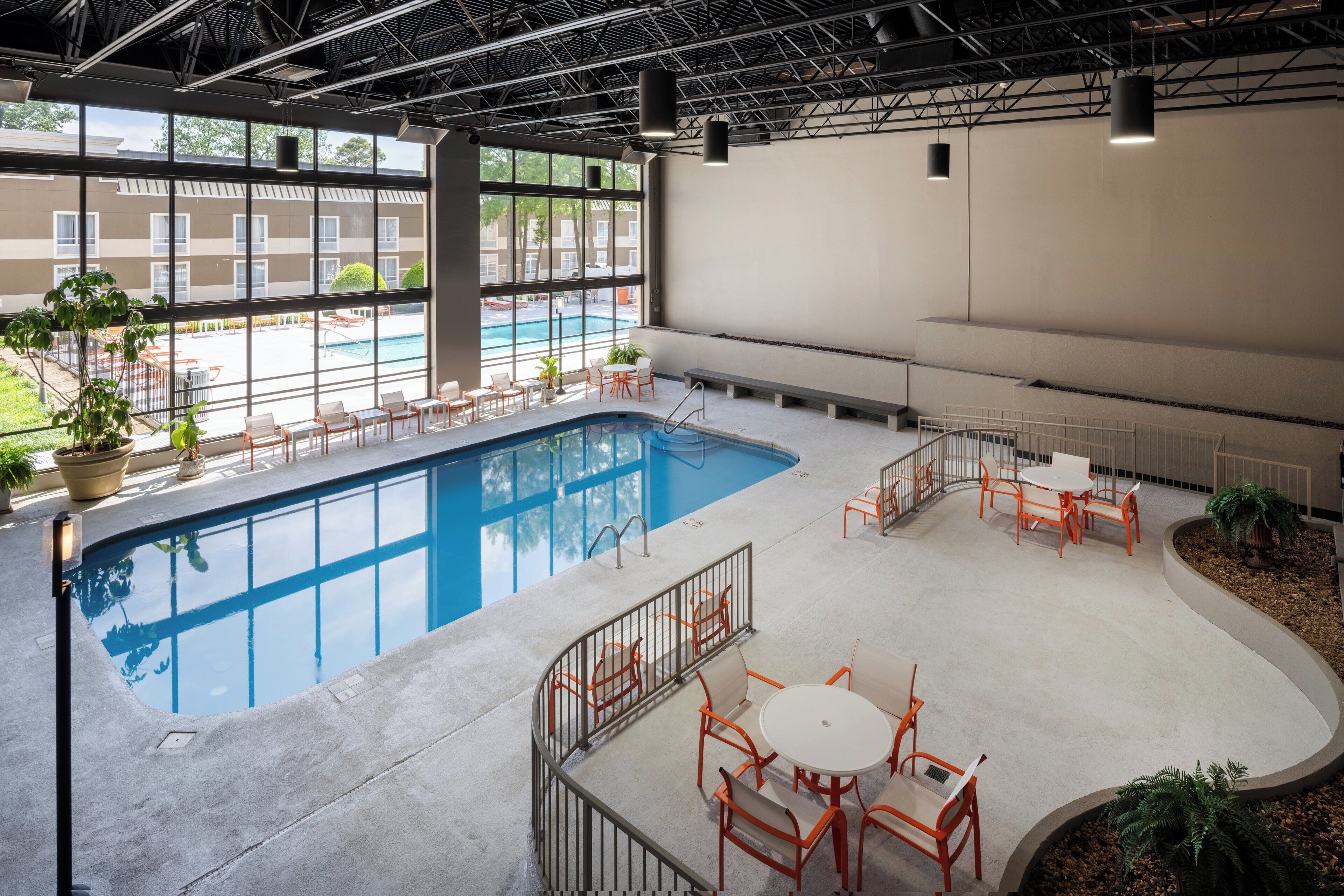 indoor pool, seasonal outdoor pool, open 7 am to 10 pm, pool umbrellas