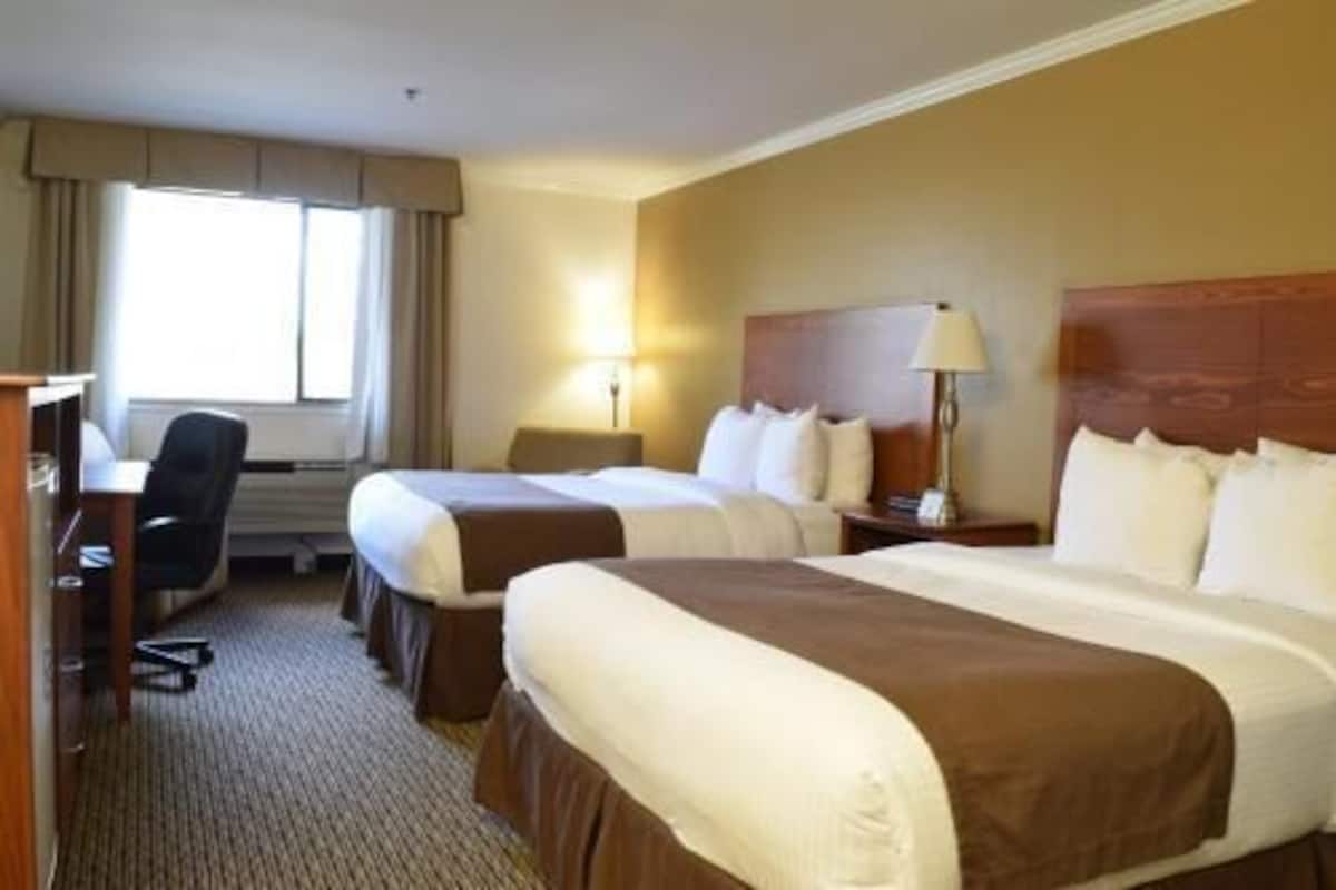 Premium bedding, pillowtop beds, desk, blackout drapes