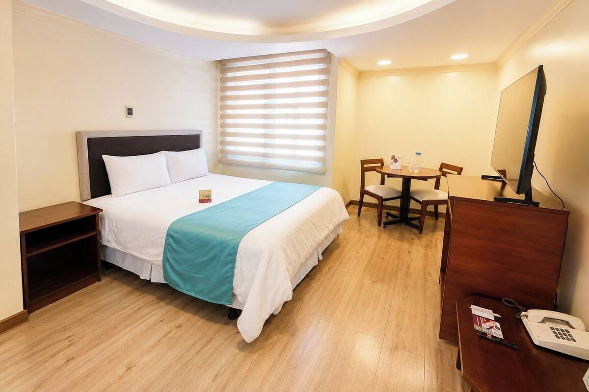Premium bedding, down duvets, in-room safe, desk