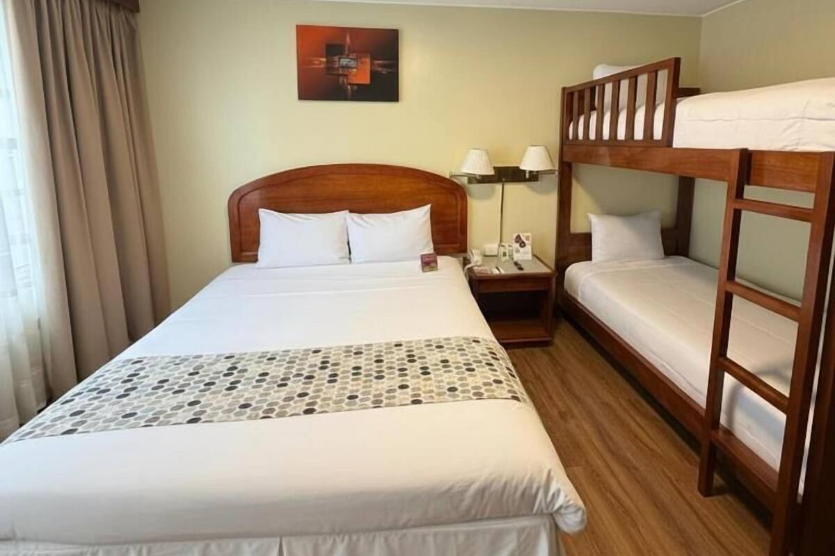 Premium bedding, down duvets, in-room safe, desk