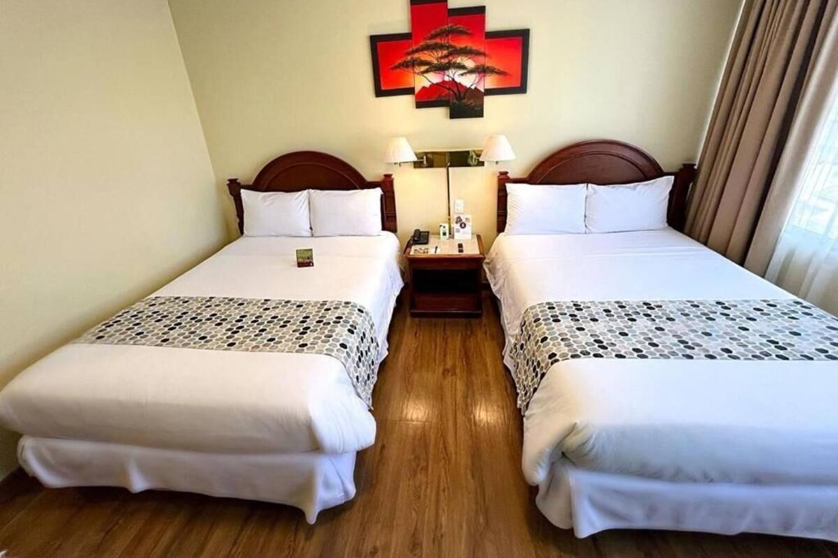 Premium bedding, down duvets, in-room safe, desk