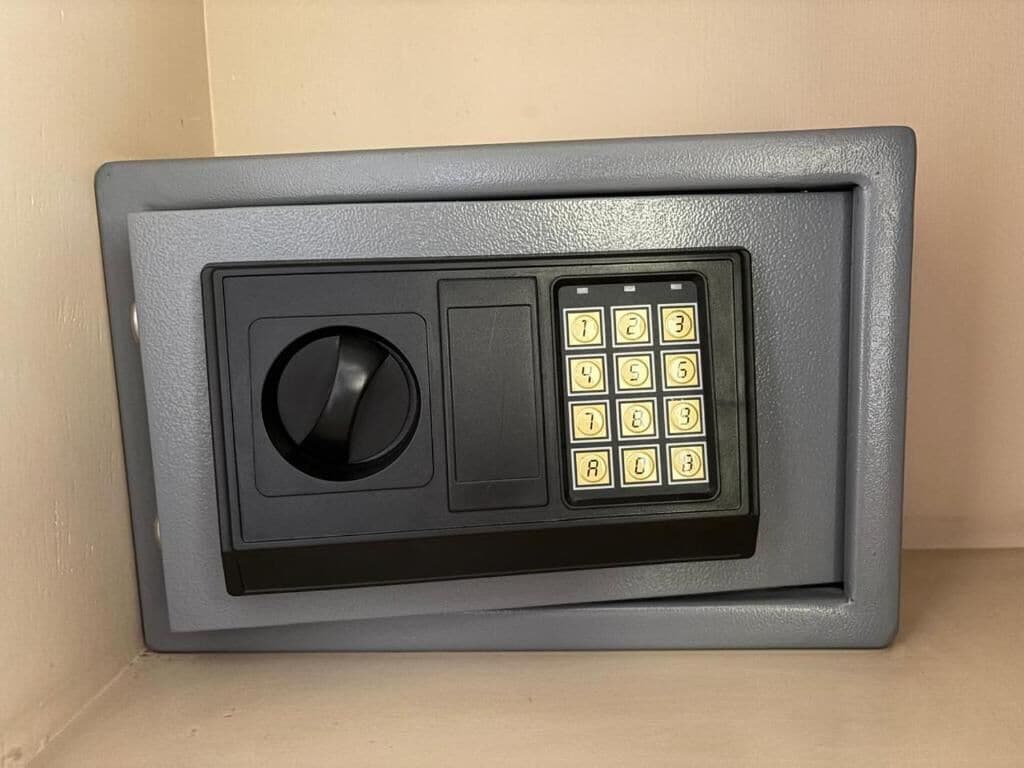 A safe with a keypad and a circular dial.