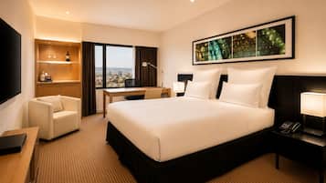 Ropa de cama de alta calidad, colchones con pillow-top y minibar