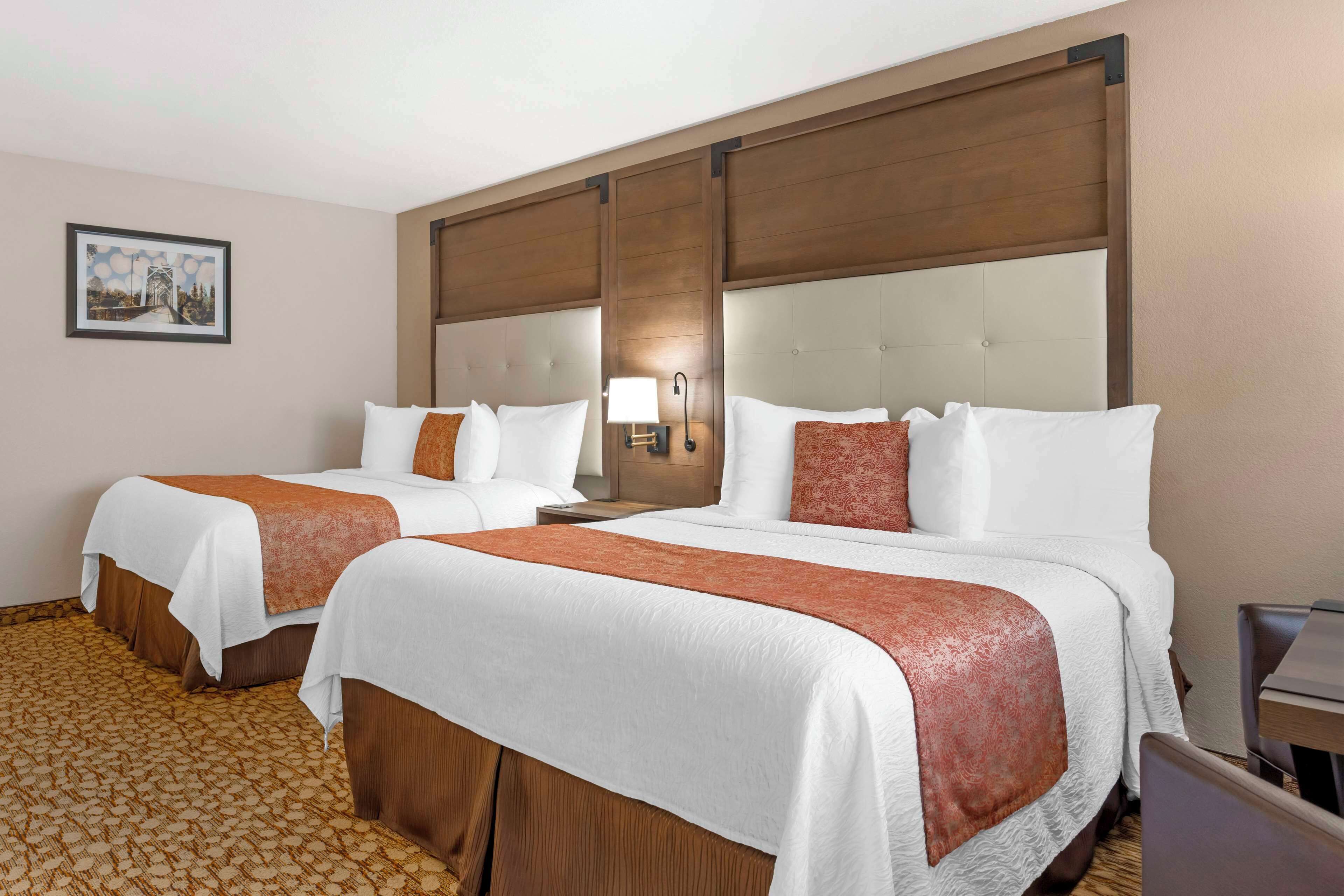 standard room, 2 queen beds, non smoking, microwave | in-room safe, desk, iron/ironing board, free wifi