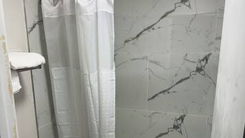 Standard Room | Bathroom | Combined shower/tub, eco-friendly toiletries, hair dryer, towels