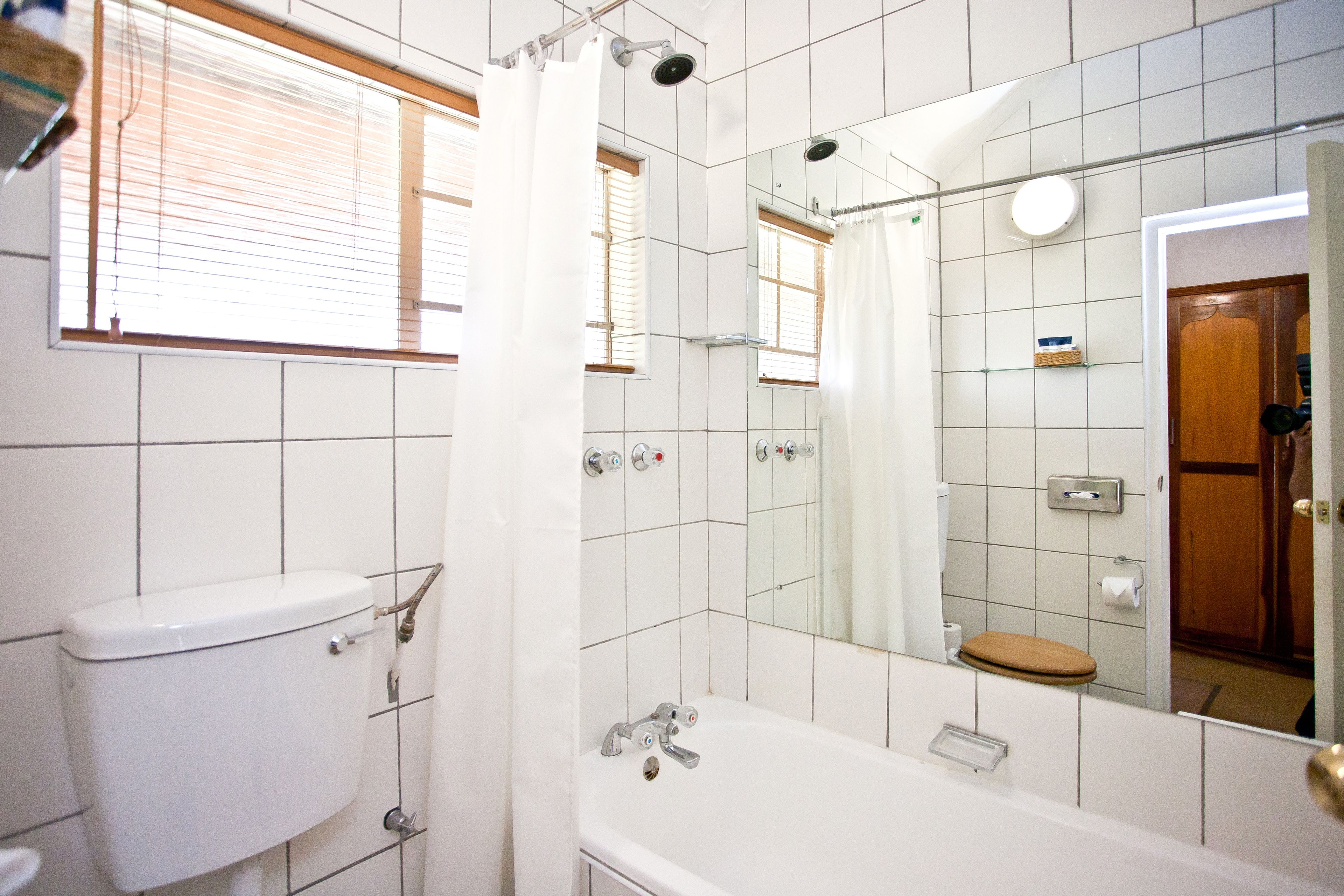 standard twin chalet | bathroom | shower, eco-friendly toiletries, hair dryer, towels