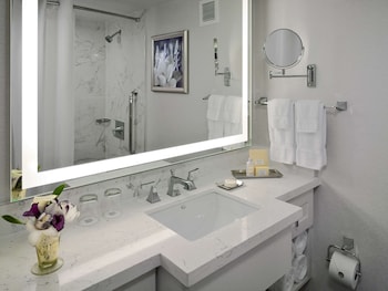 Separate tub and shower, designer toiletries, hair dryer, bathrobes at The Royal Sonesta New Orleans