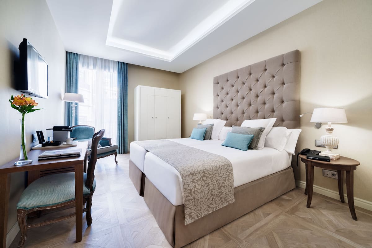 1 habitación, ropa de cama de alta calidad y minibar
