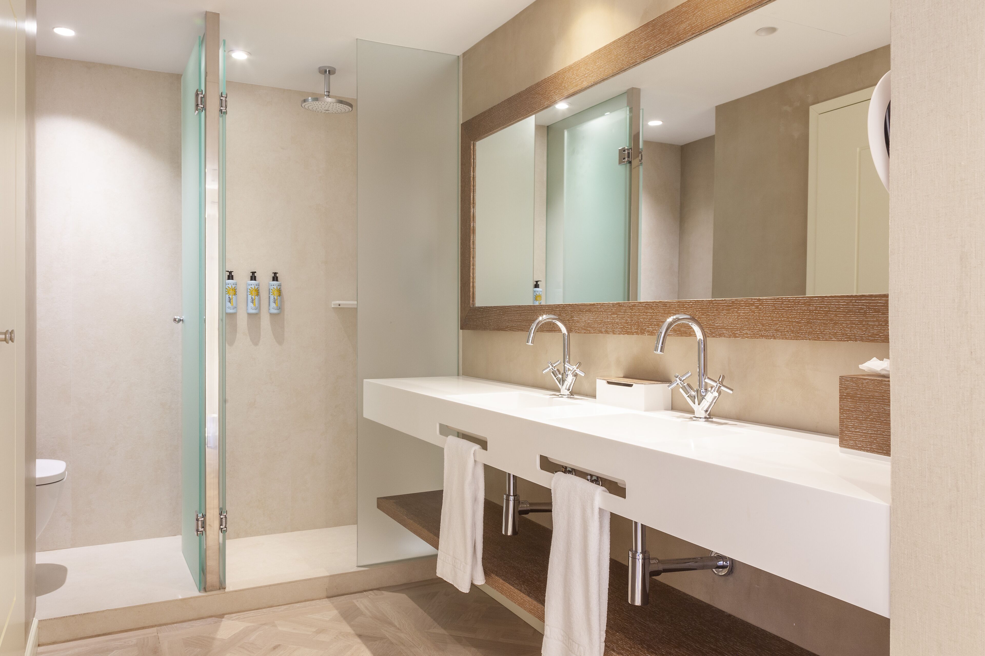 eco-friendly toiletries, hair dryer, bathrobes, slippers