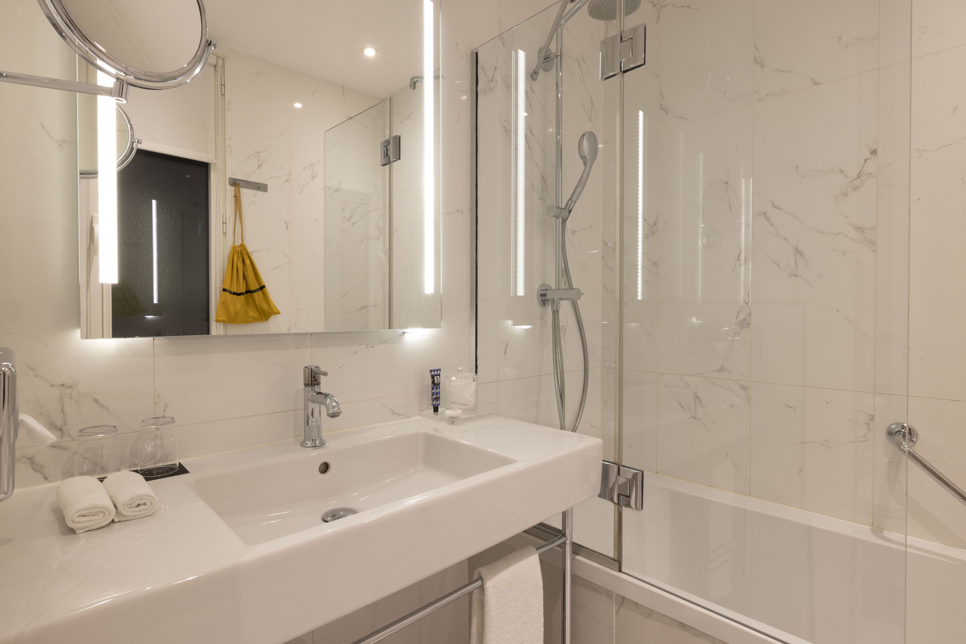 eco-friendly toiletries, hair dryer, bathrobes, slippers