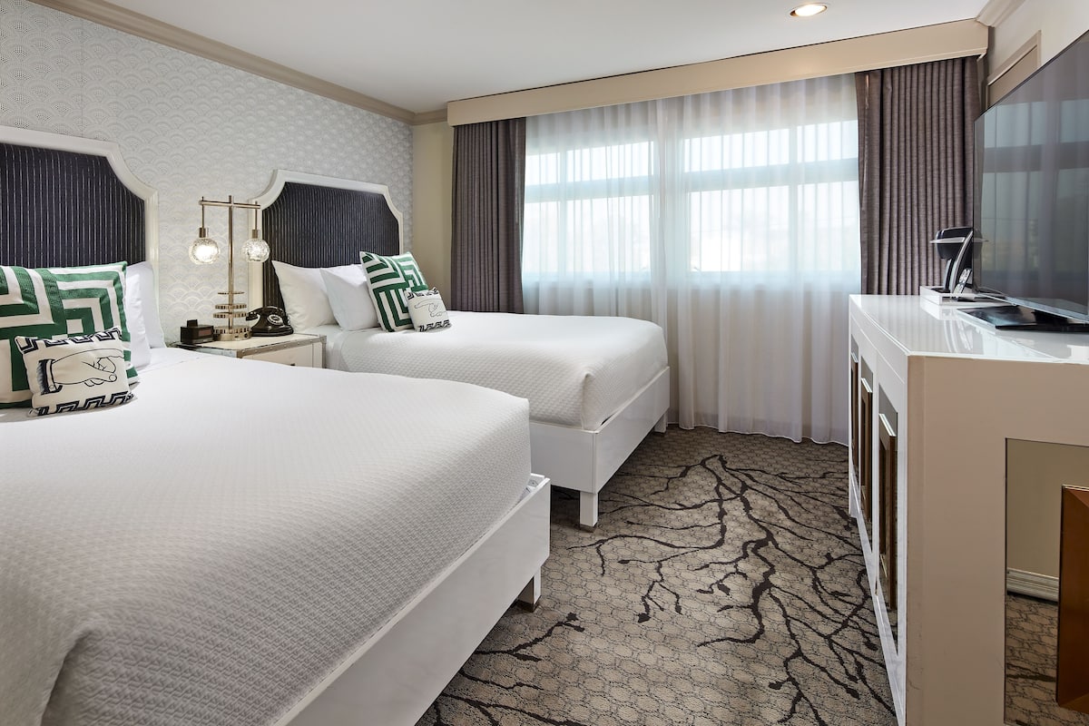 Premium bedding, down comforters, pillowtop beds, in-room safe