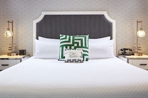 Premium bedding, down comforters, pillowtop beds, in-room safe