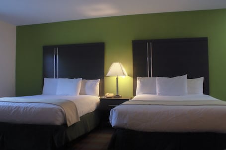 Suite, 2 Queen Beds, Mountain View | 1 bedroom, desk, laptop workspace, blackout drapes