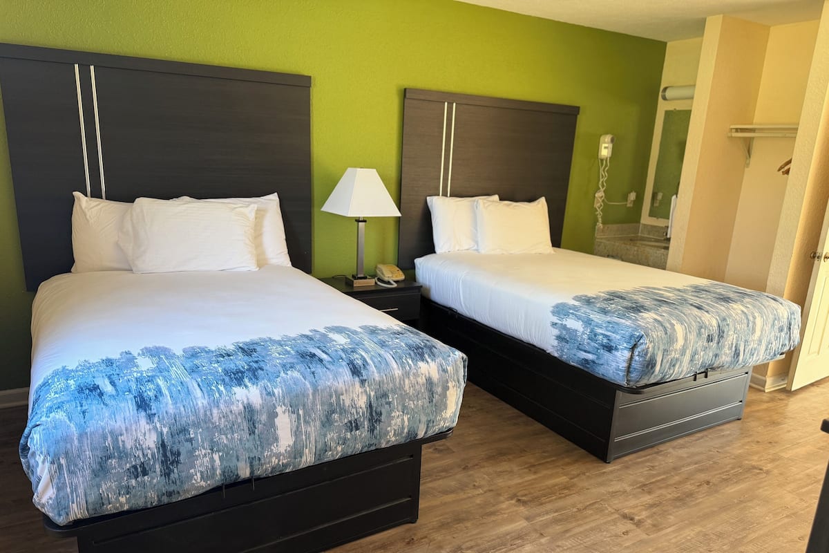 Standard Room, 2 Double Beds, Non Smoking | 1 bedroom, desk, laptop workspace, blackout drapes