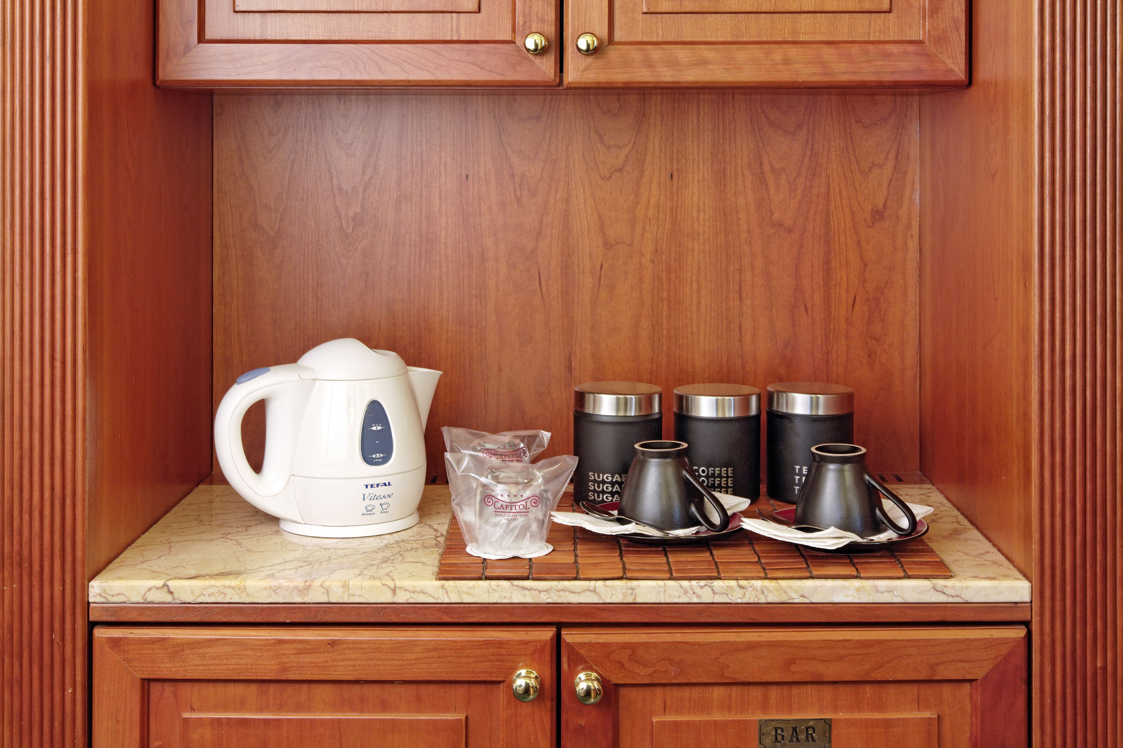 suite | coffee and/or coffee maker