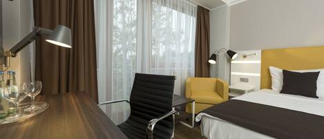 Hypo-allergenic bedding, iron/ironing board, free cots/infant beds