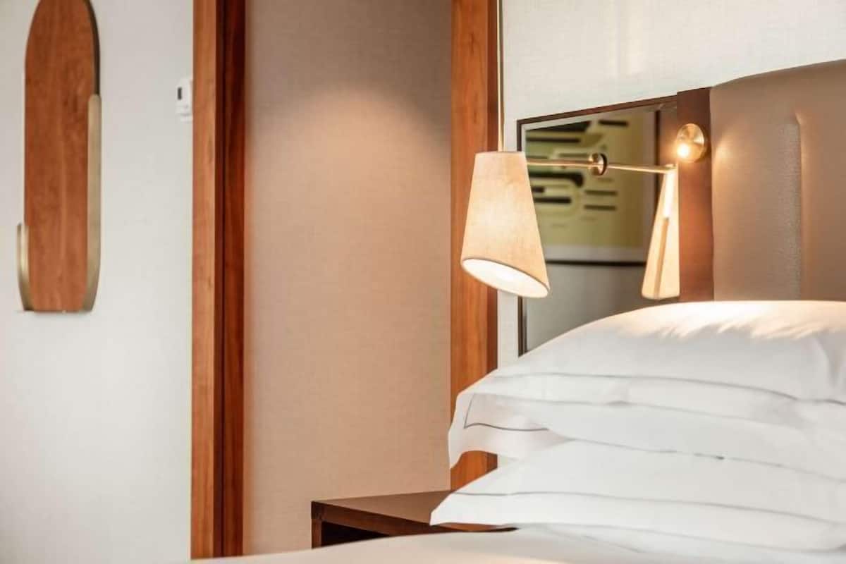 Premium bedding, minibar, in-room safe, laptop workspace