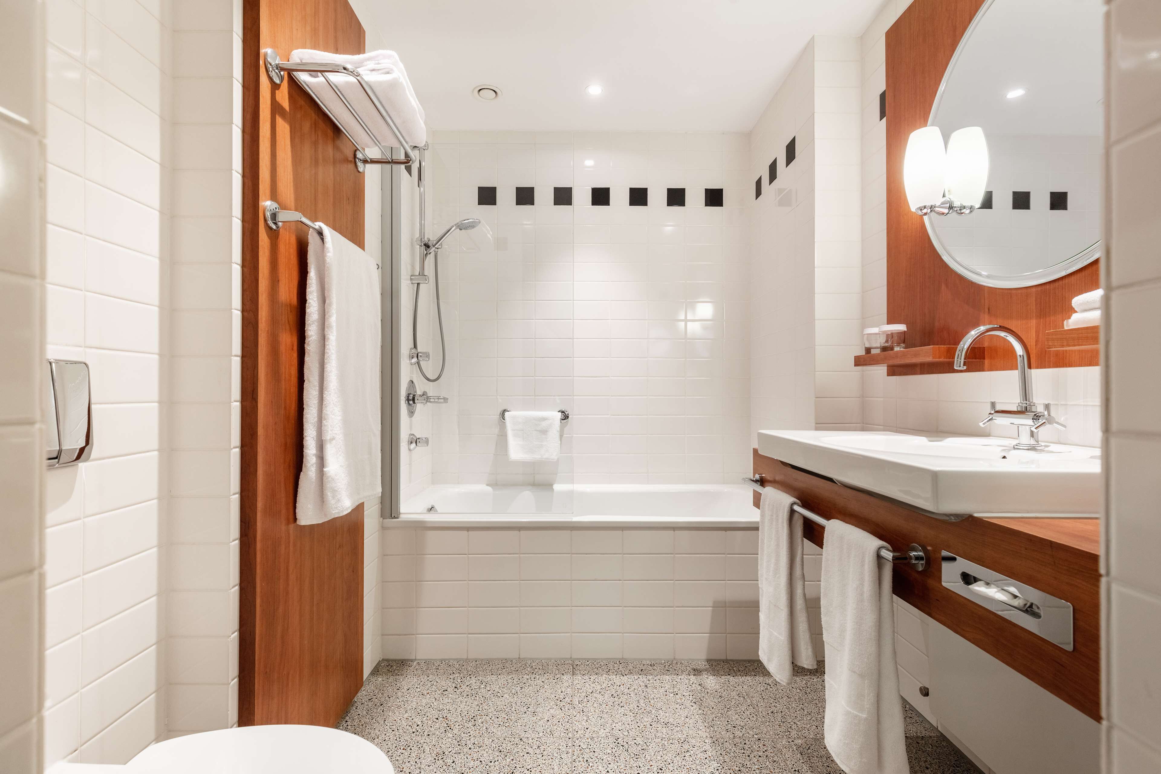 eco-friendly toiletries, hair dryer, towels, soap