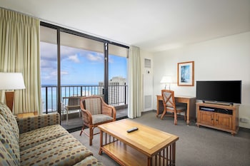 Suite, 1 Bedroom, Ocean View | In-room safe, desk, blackout drapes, iron/ironing board at Aston Waikiki Sunset