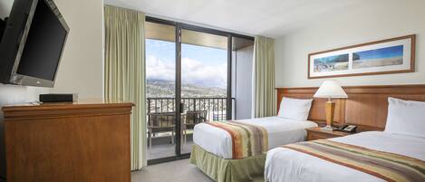 A hotel room with two beds, a TV, a balcony with a view, and a painting on the wall.