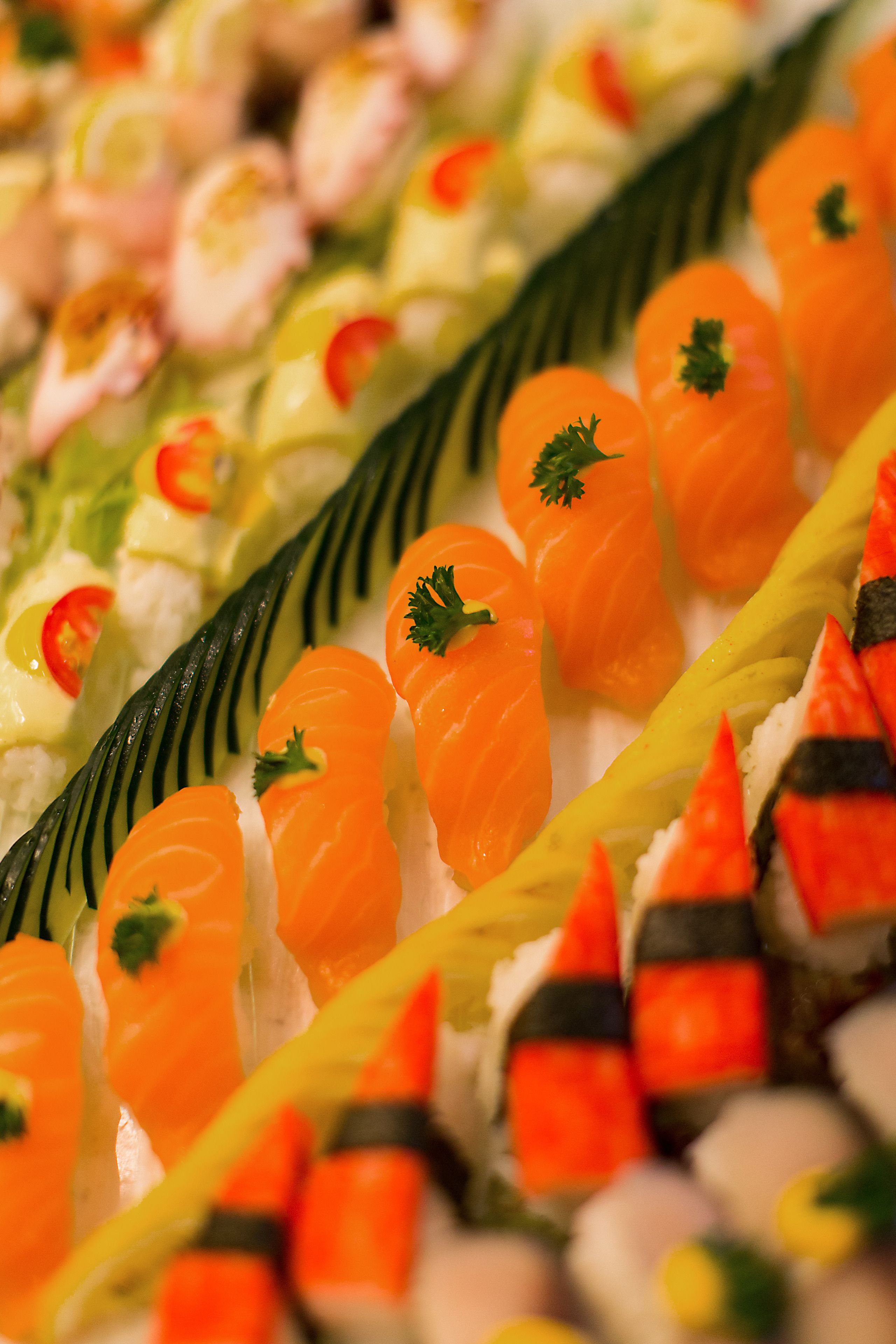 A variety of sushi dishes arranged on a platter.