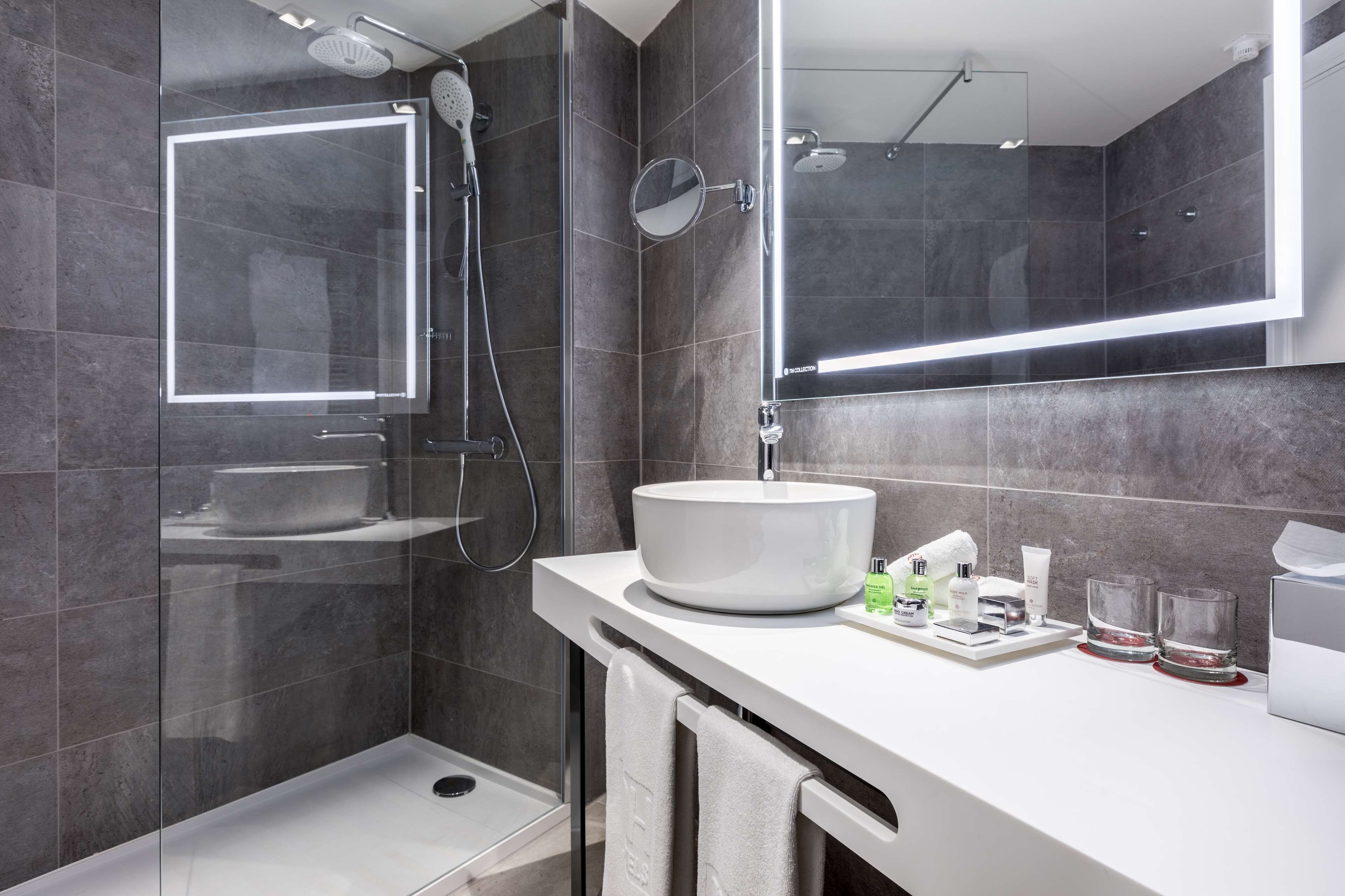 eco-friendly toiletries, hair dryer, towels