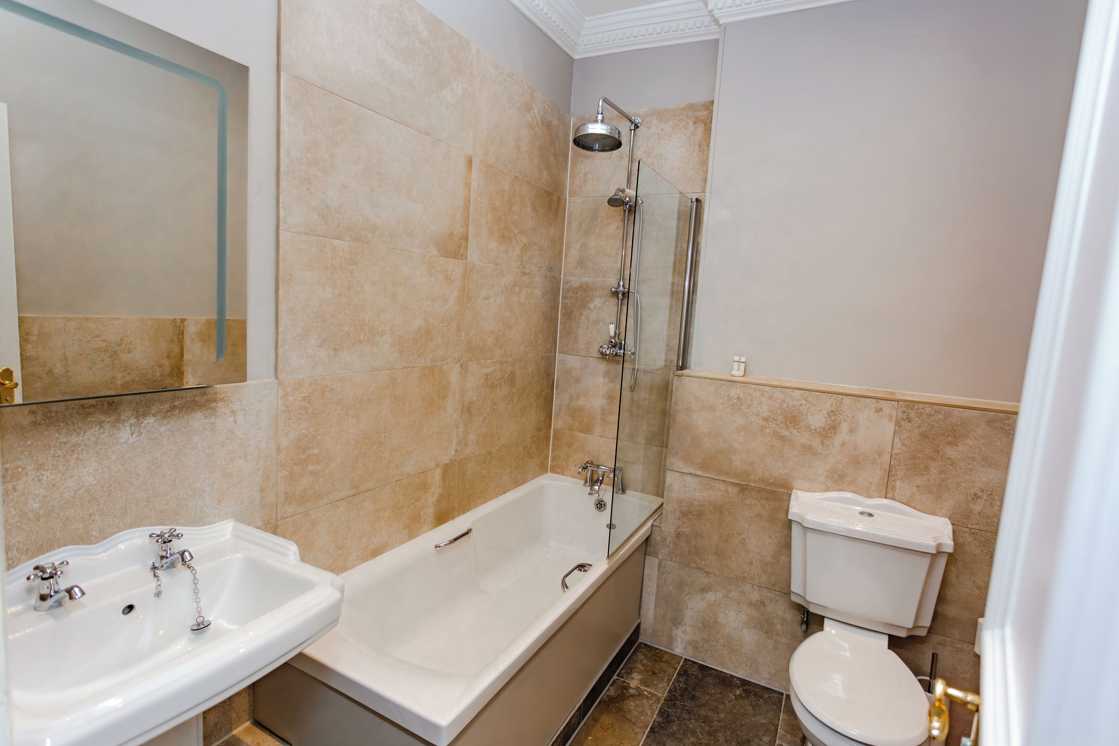 combined shower/bathtub, eco-friendly toiletries, hair dryer, bathrobes